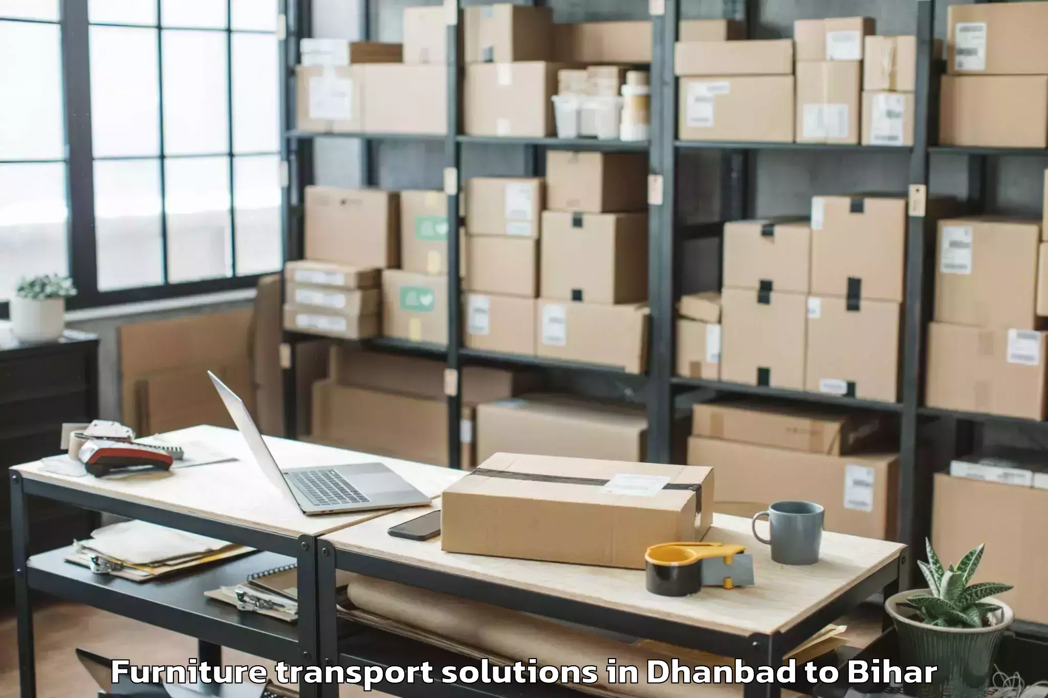 Trusted Dhanbad to Barauli Furniture Transport Solutions